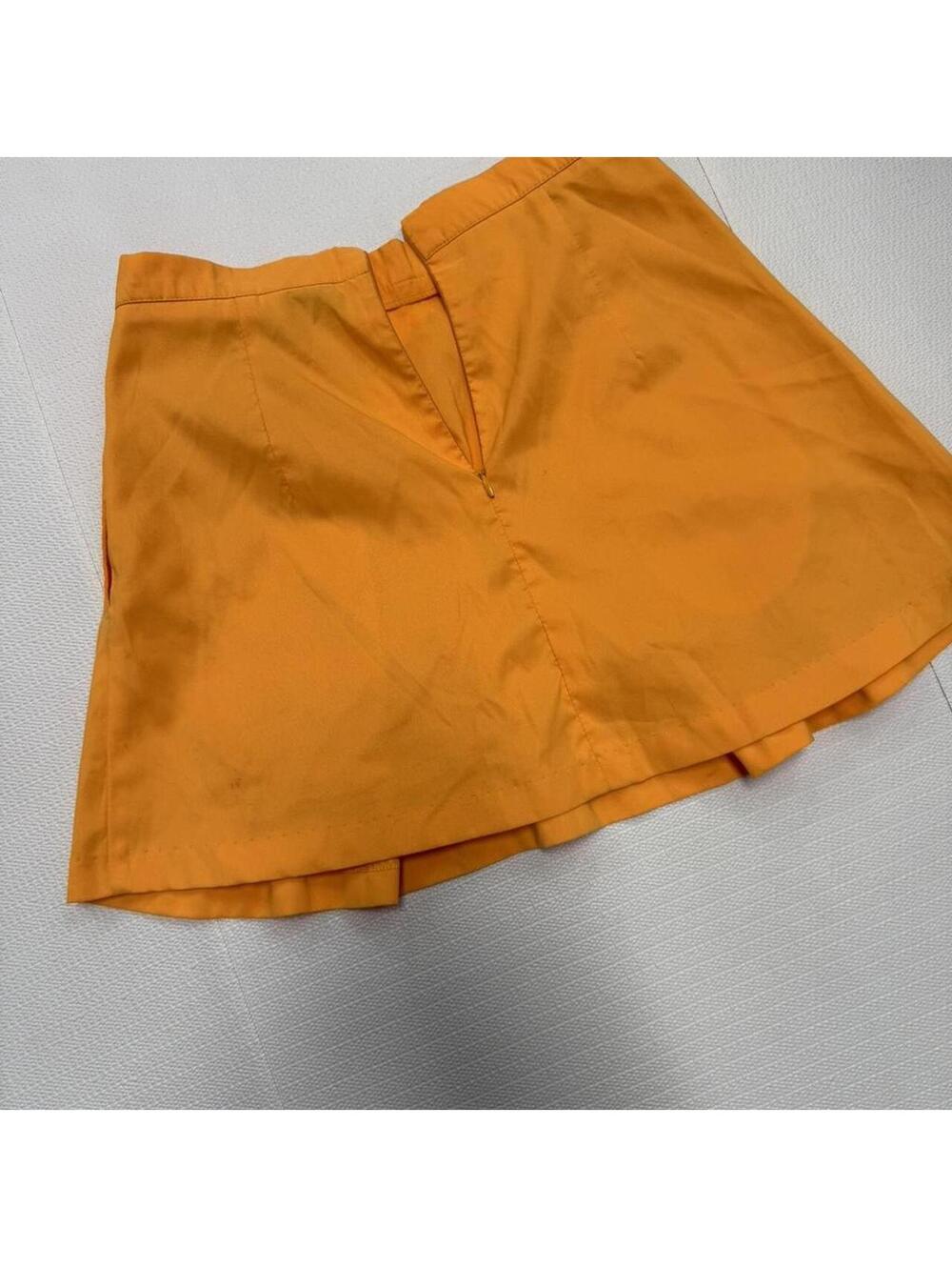 1999 Nike Court Challenge tennis skirt featuring a yellow colorway.